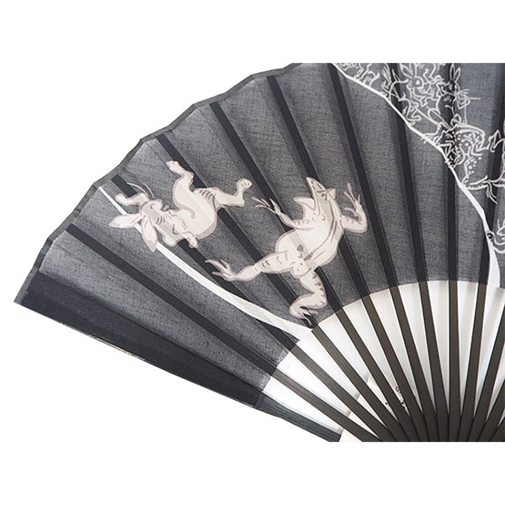 Folding Hand Fan for Men,Surface Cotton ,Bamboo Frame,  Beige base ,  “Chōjū-giga” animal caricatures  design